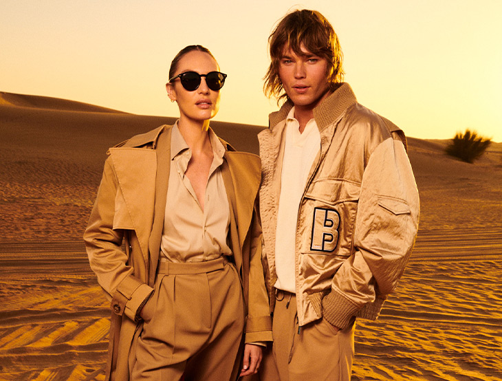 NEW Branding – Dubai event – two people in the desert (photo)